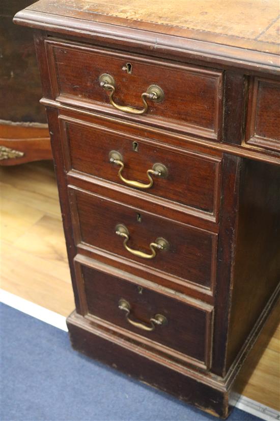 A pedestal desk, W.122cm